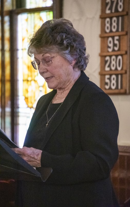 Lay Leader Retta Rose Frampton begins a passage in The Seven Last Words of Christ.